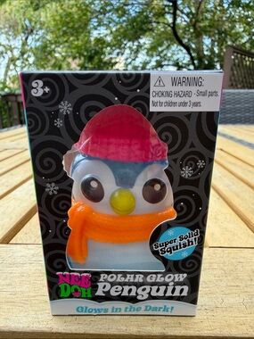 Nee Doh Polar Glow Penguin Toy - Pink Hat, Orange Scarf